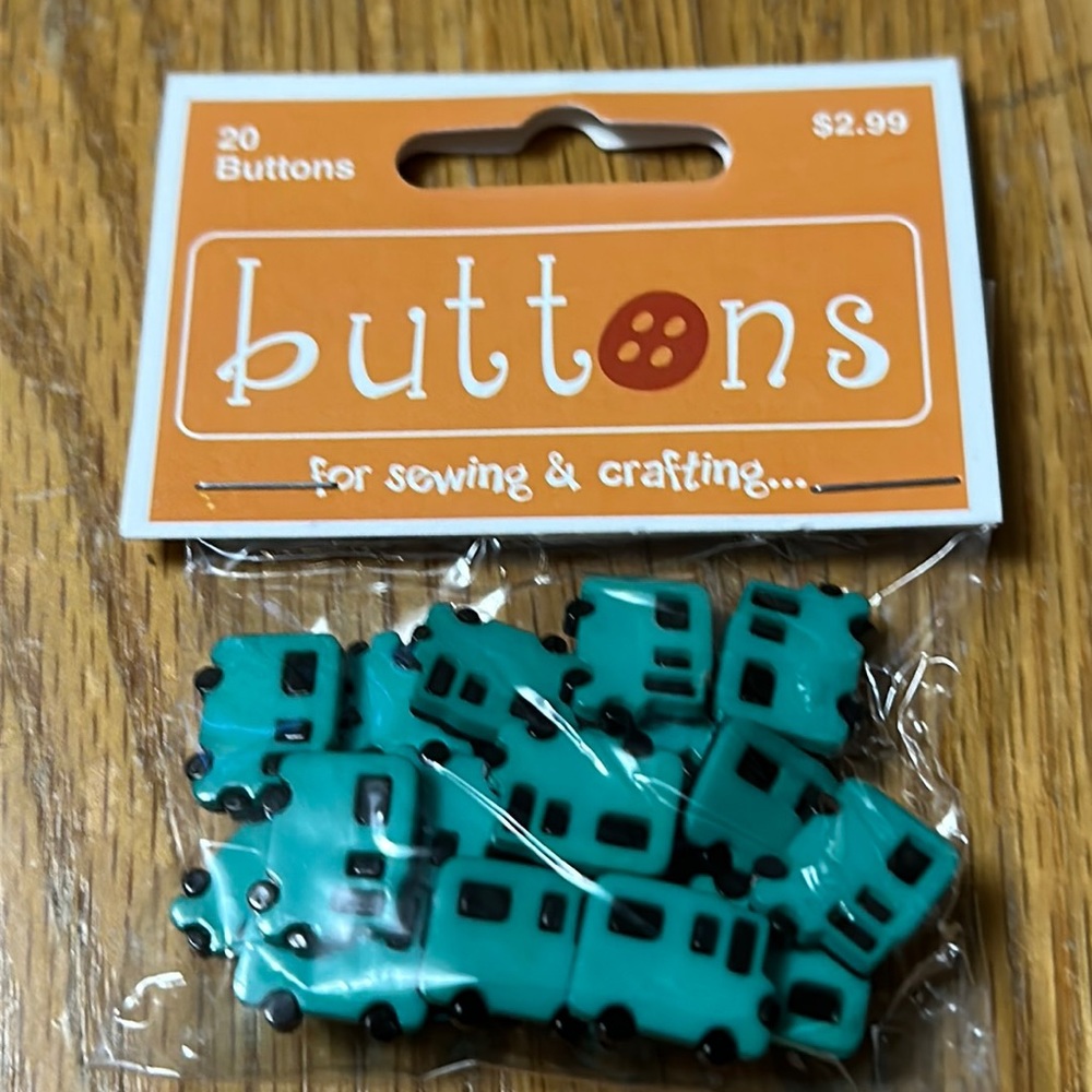 Turquoise and black plastic buttons $1 if bundled